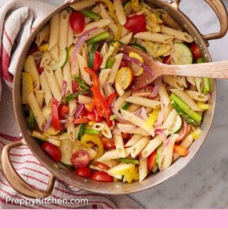 Pinterest graphic of a pot of pasta primavera with some torn bread on the side.