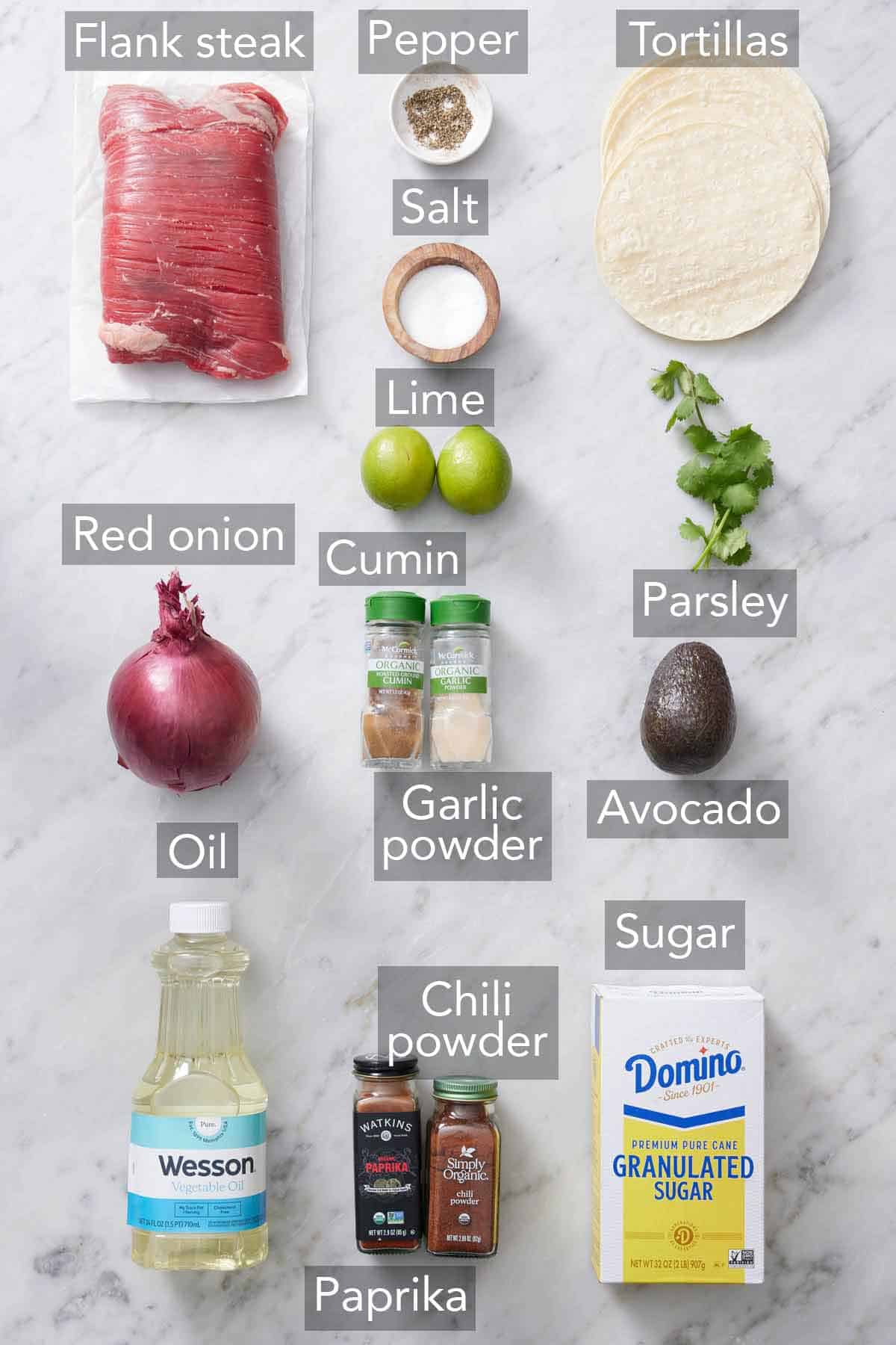 Ingredients needed to make steak tacos.