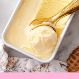 Pinterest graphic of a close view of vanilla ice cream in a rectangular baking dish with an ice cream scoop scooping out ice cream.