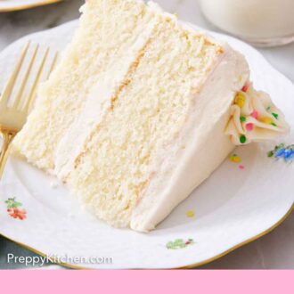 Pinterest graphic of a slice of white cake lying on its side on a plate, showing the two layers with frosting in between.