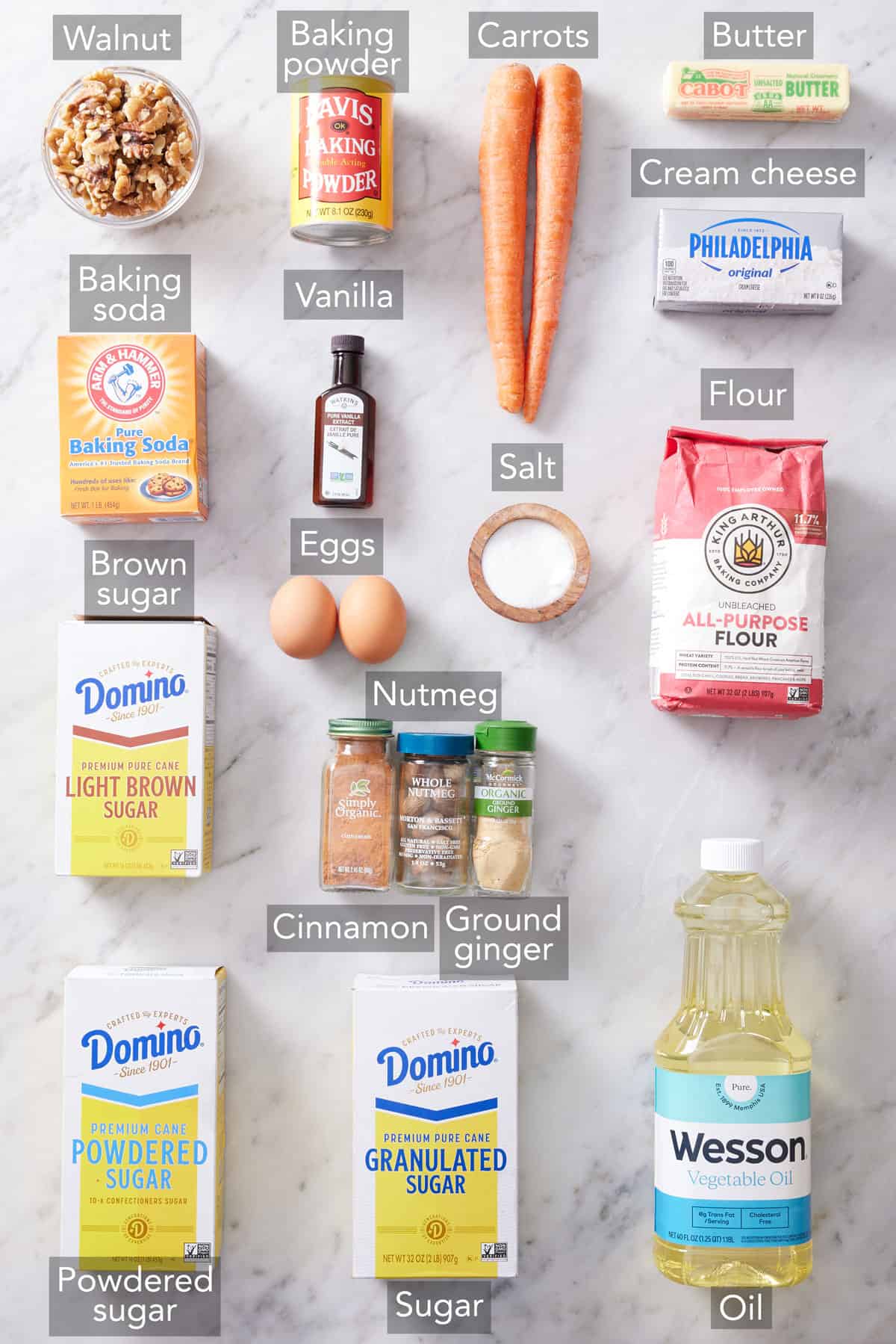 Ingredients needed to make carrot cake cupcakes.
