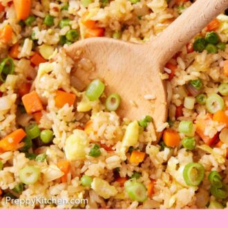 Pinterest graphic of a wooden spoon inside a skillet of fried rice.