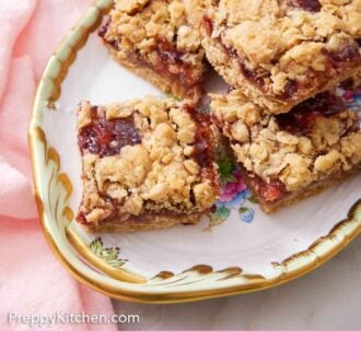 Pinterest graphic of an overhead view of a platter of raspberry bars.