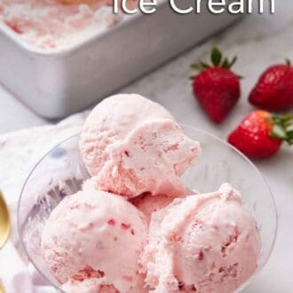 Pinterest graphic of a bowl with scoops of strawberry ice cream with fresh strawberries in the background along with a container of more ice cream.