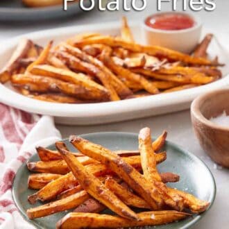 Pinterest graphic of a green plate with air fryer sweet potato fries with a platter more in the background along with ketchup.