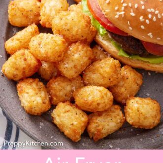 Pinterest graphic of a plate of air fryer tater tots beside a hamburger.