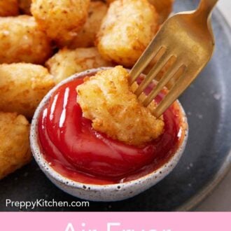 Pinterest graphic of an air fryer tater tot on a fork dipped into ketchup.