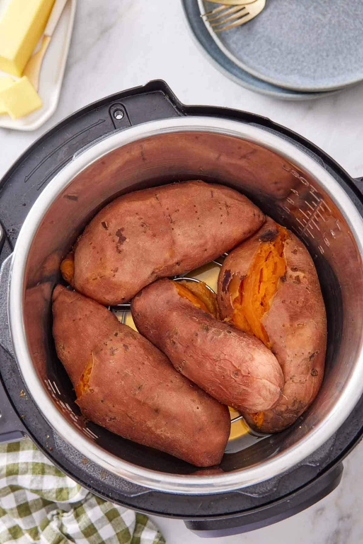 An overhead view of cooked sweet potatoes in an instant pot.