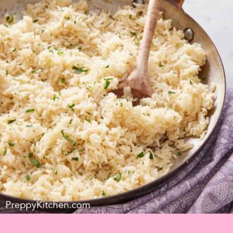 Pinterest graphic of a skillet of rice pilaf with a wooden spoon tucked in.