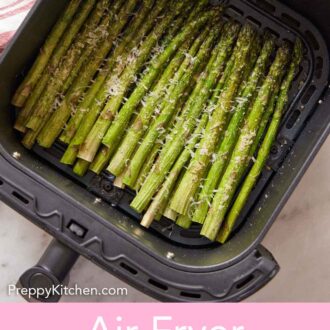 Pinterest graphic of an overhead view of air fryer asparagus in an air fryer basket.
