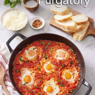 Pinterest graphic of a skillet of eggs in purgatory. A board with sliced bread, bowl of shredded cheese, basil, salt, and red pepper flakes.