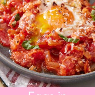 Pinterest graphic of plate of eggs in purgatory with the egg yolk broken.