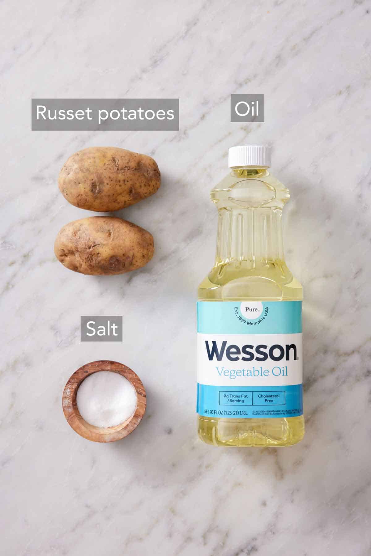 Ingredients needed to make homemade potato chips.