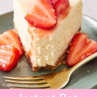 Pinterest graphic of a close up view of a slice of Instant Pot cheesecake with the tip eaten. Strawberries on top and beside it.