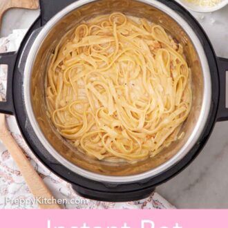 Pinterest graphic of an overhead view of chicken alfredo in the Instant Pot. A stack of plates, forks, a bowl of cheese, and sliced bread with parsley on the side.
