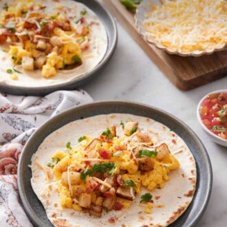 Pinterest graphic of a plate with a breakfast taco with another plate in the background along with toppings.