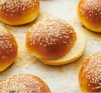 Pinterest graphic of a sheet pan with multiple burger buns.