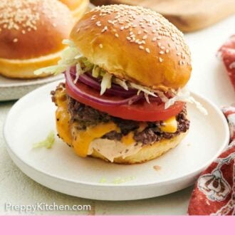 Pinterest graphic of a plate with a burger with homemade burger buns and toppings in the background.