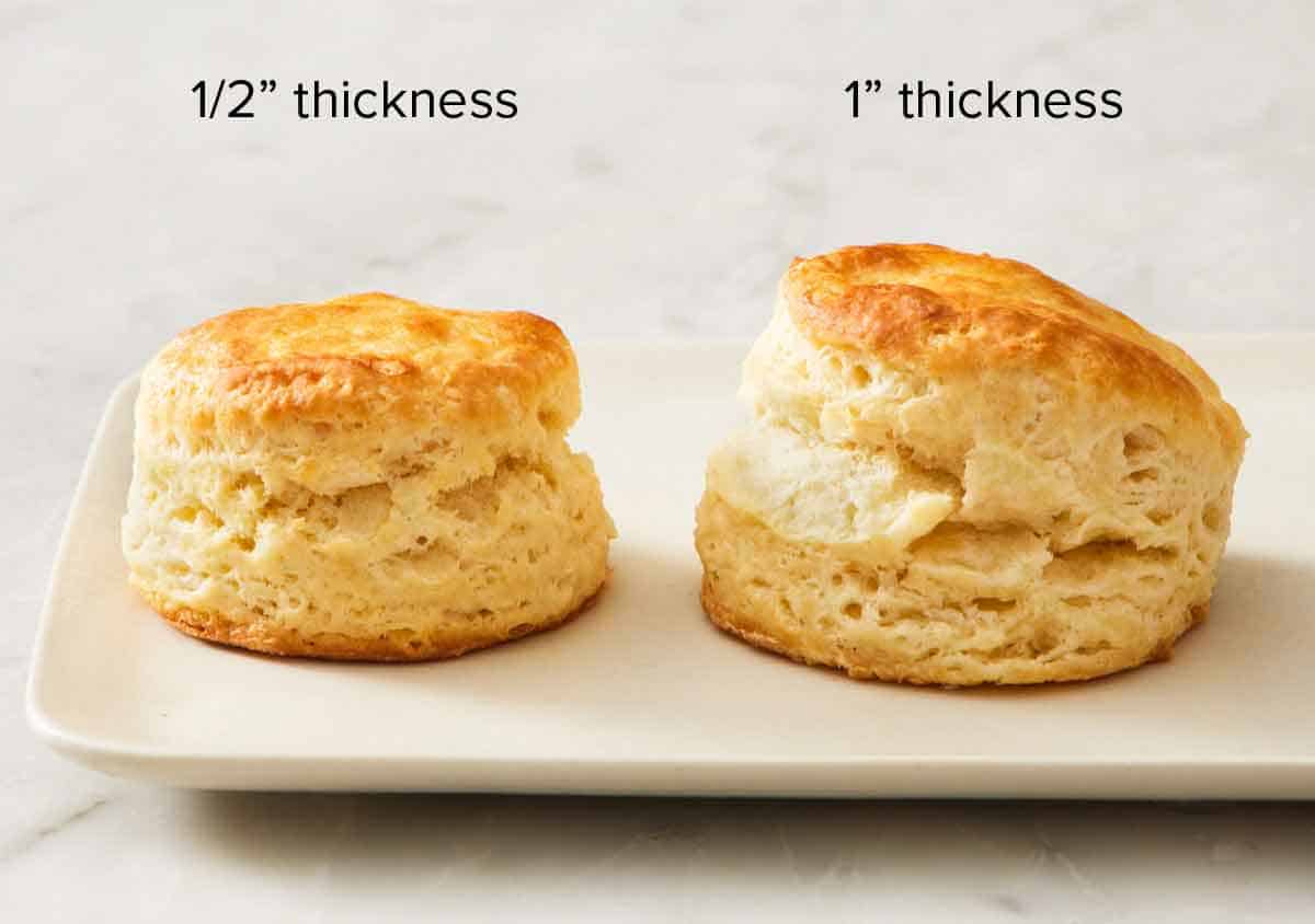 Two buttermilk biscuits showing their different heights.