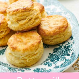 Pinterest graphic of a platter with buttermilk biscuits with honey in the background and another plate.