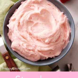 Pinterest graphic of a bowl of strawberry frosting. Strawberries off to the side.