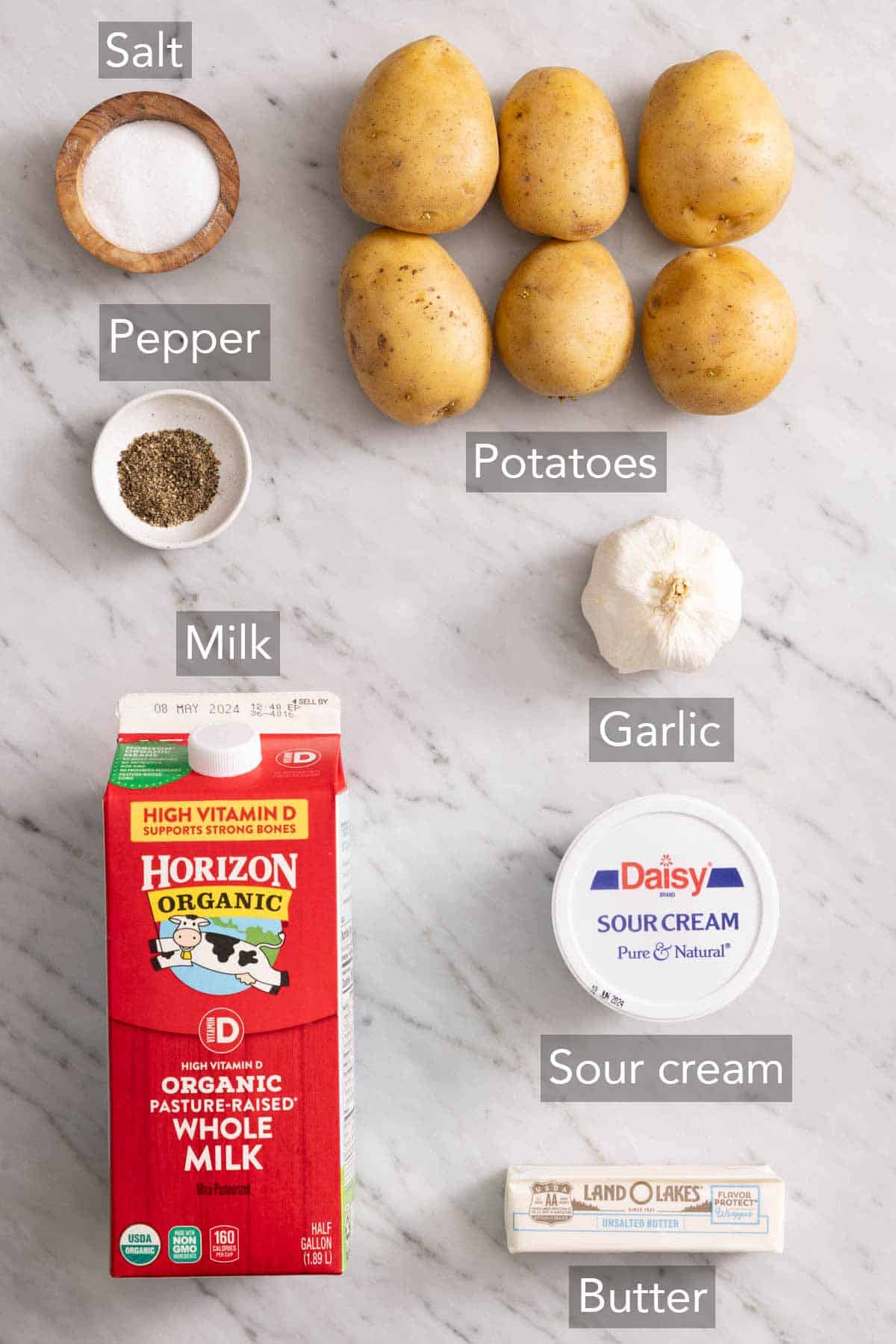 Ingredients needed to make garlic mashed potatoes.