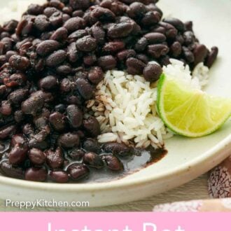 Pinterest graphic of a close up view of a plate of Instant Pot black beans over rice with a wedge of lime.