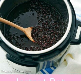 Pinterest graphic of black beans inside of an Instant Pot with a wooden spoon.