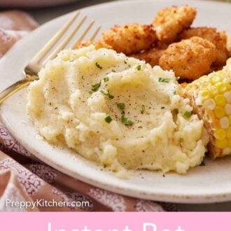 Pinterest graphic of a plate of Instant Pot mashed potatoes with a fork along with some corn and breaded meat.