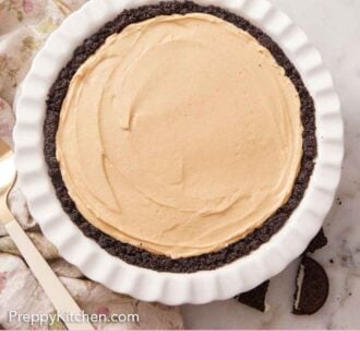 Pinterest graphic of an overhead view of a peanut butter pie in a white baking dish.