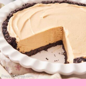Pinterest graphic of a peanut butter pie in a baking dish with a slice cut out.
