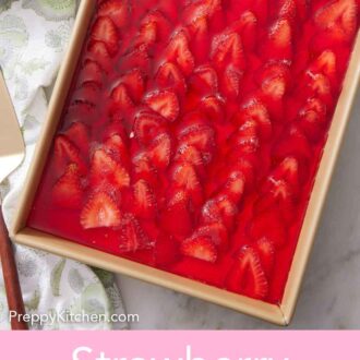 Pinterest graphic of a rectangular baking dish of strawberry pretzel salad.