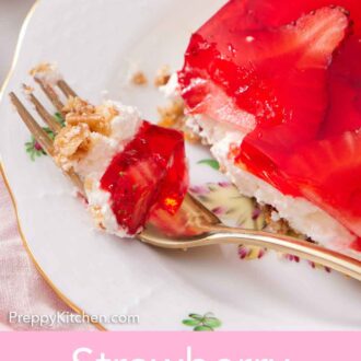 Pinterest graphic of a fork with a bite of strawberry pretzel salad from a plate with a slice.