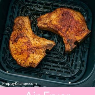 Pinterest graphic of two pork chops in an air fryer basket.