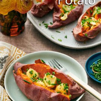 Pinterest graphic of a baked sweet potato on a plate, garnished with butter and chives with a fork. A platter with three more in the background along with some flowers in a vase.