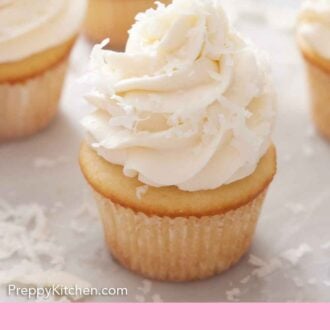 Pinterest graphic of a cupcake topped with coconut frosting and shaved coconut.