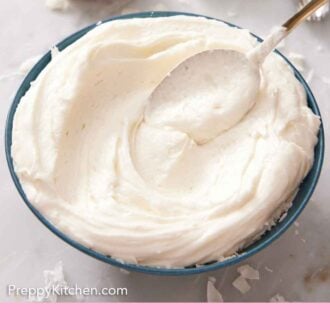 Pinterest graphic of a bowl of coconut frosting with a spoon spread it.