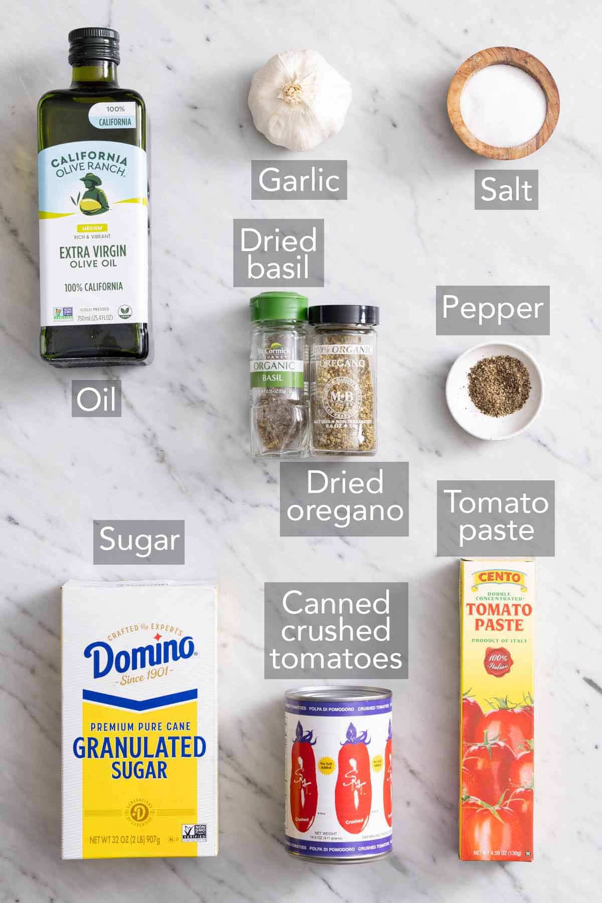 Ingredients needed to make homemade pizza sauce.