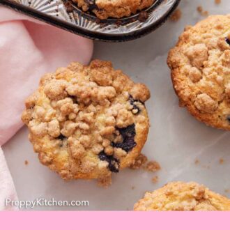 Pinterest graphic of muffins with streusel toppings with a couple in the muffin tin.