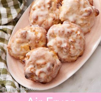 Pinterest graphic of a platter with six air fryer apple fritters.