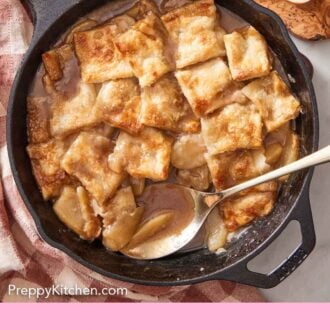 Pinterest graphic of a skillet of apple pandowdy with a spoon tucked in.