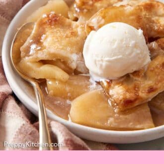 Pinterest graphic of a plate with apple pandowdy with a scoop of vanilla ice cream with a spoon.