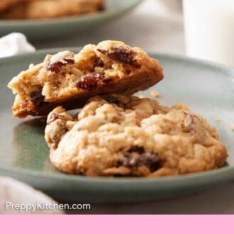 Pinterest graphic of a plate with a oatmeal cookie and half a cookie leaning on top, showing the interior.