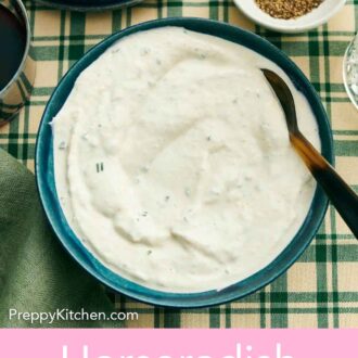 Pinterest graphic of an overhead view of a bowl of horseradish sauce with a spoon.