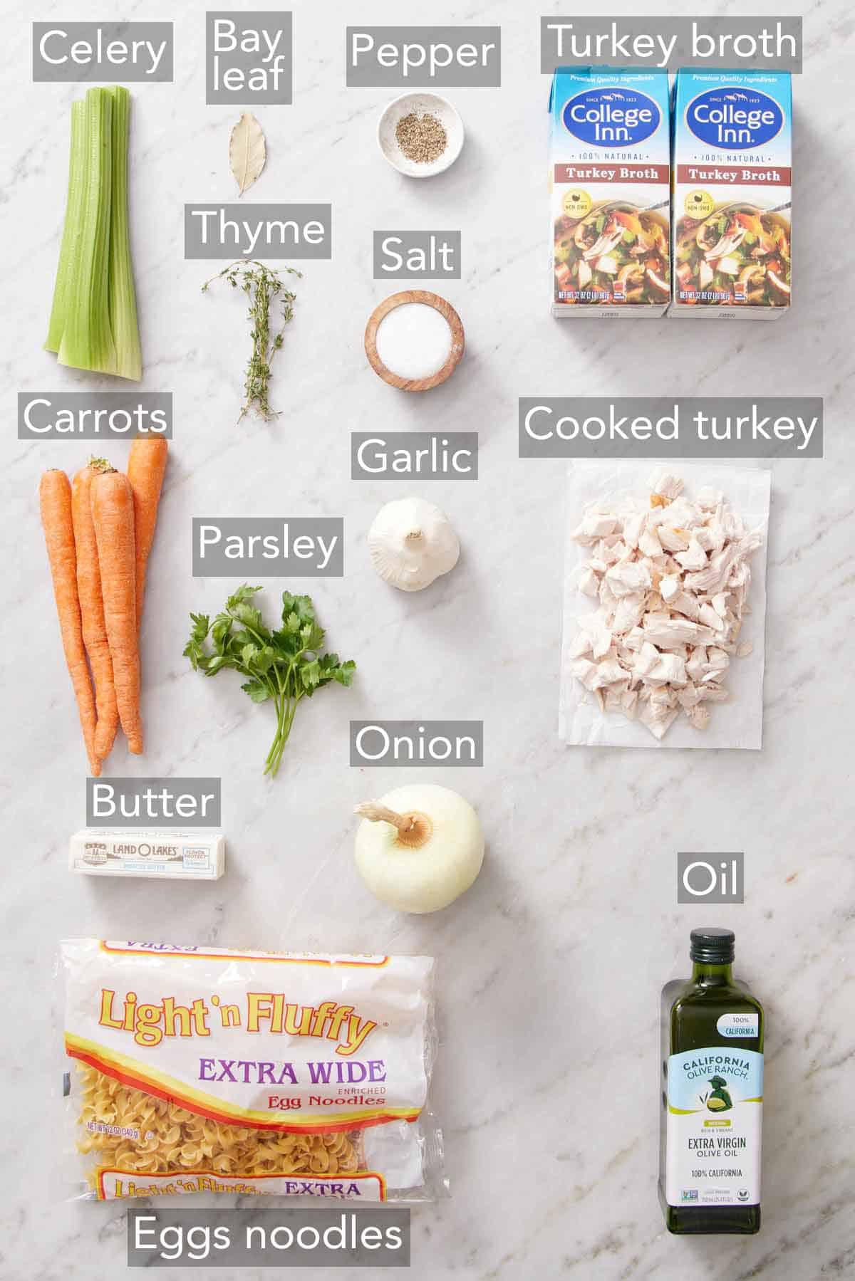 Ingredients needed to make turkey noodle soup.