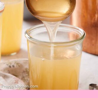 Pinterest graphic of a ladle pouring turkey stock into a tall jar.