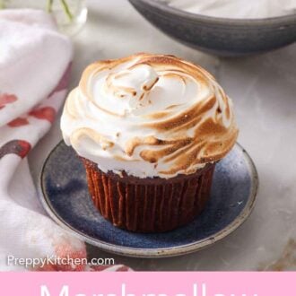 Pinterest graphic of a cupcake topped with marshmallow frosting then toasted with a bowl of frosting in the background.