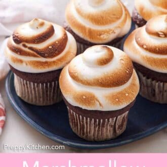 Pinterest graphic of multiple cupcakes with marshmallow frosting on top, toasted.