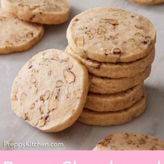 Pinterest graphic of a stack of pecan shortbread cookies with one cookie leaning against it.