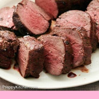 Pinterest graphic of a close up view of sliced beef tenderloin on a platter.